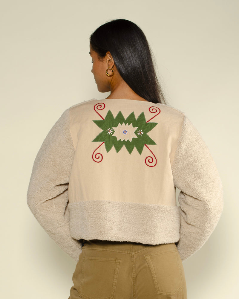 Blouson bouclette v de vinster