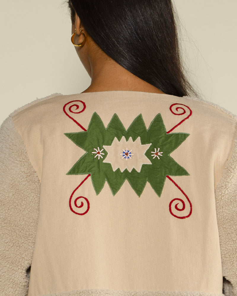 Blouson bouclette v de vinster